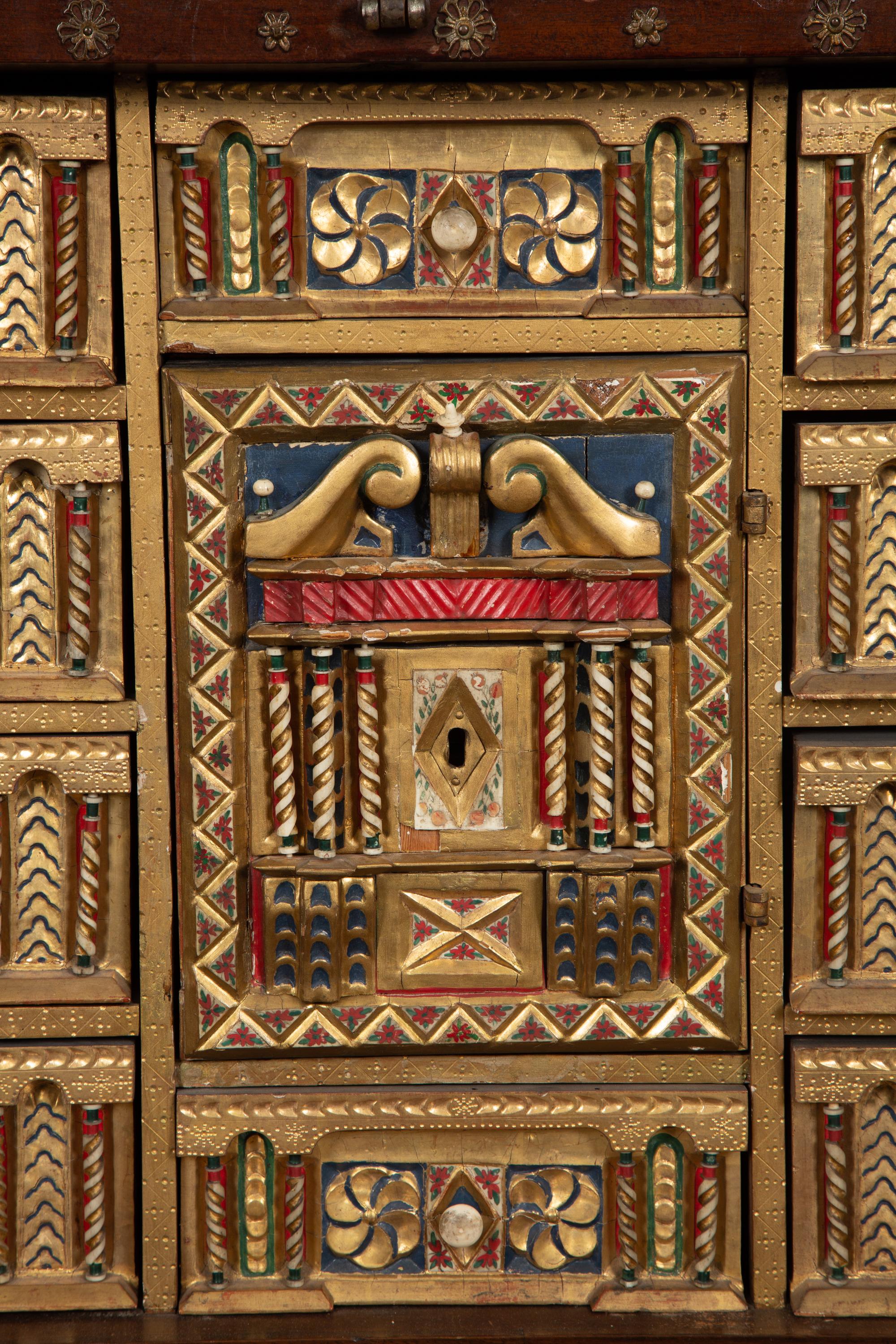 A Spanish Renaissance Style Walnut Vargueno on Later Stand