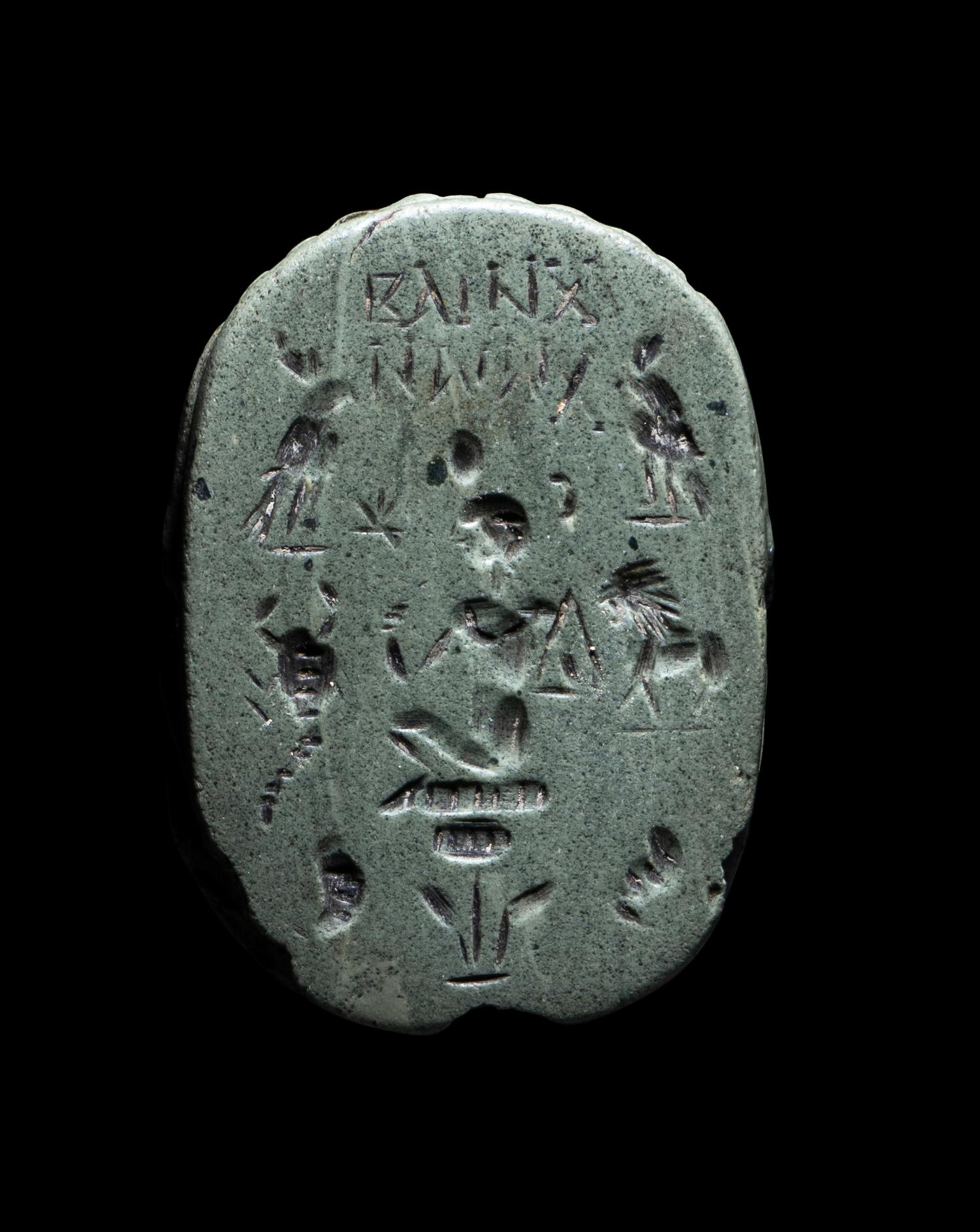 An Egyptian Faience Scarab with a Greek Inscription