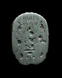 An Egyptian Faience Scarab with a Greek Inscription