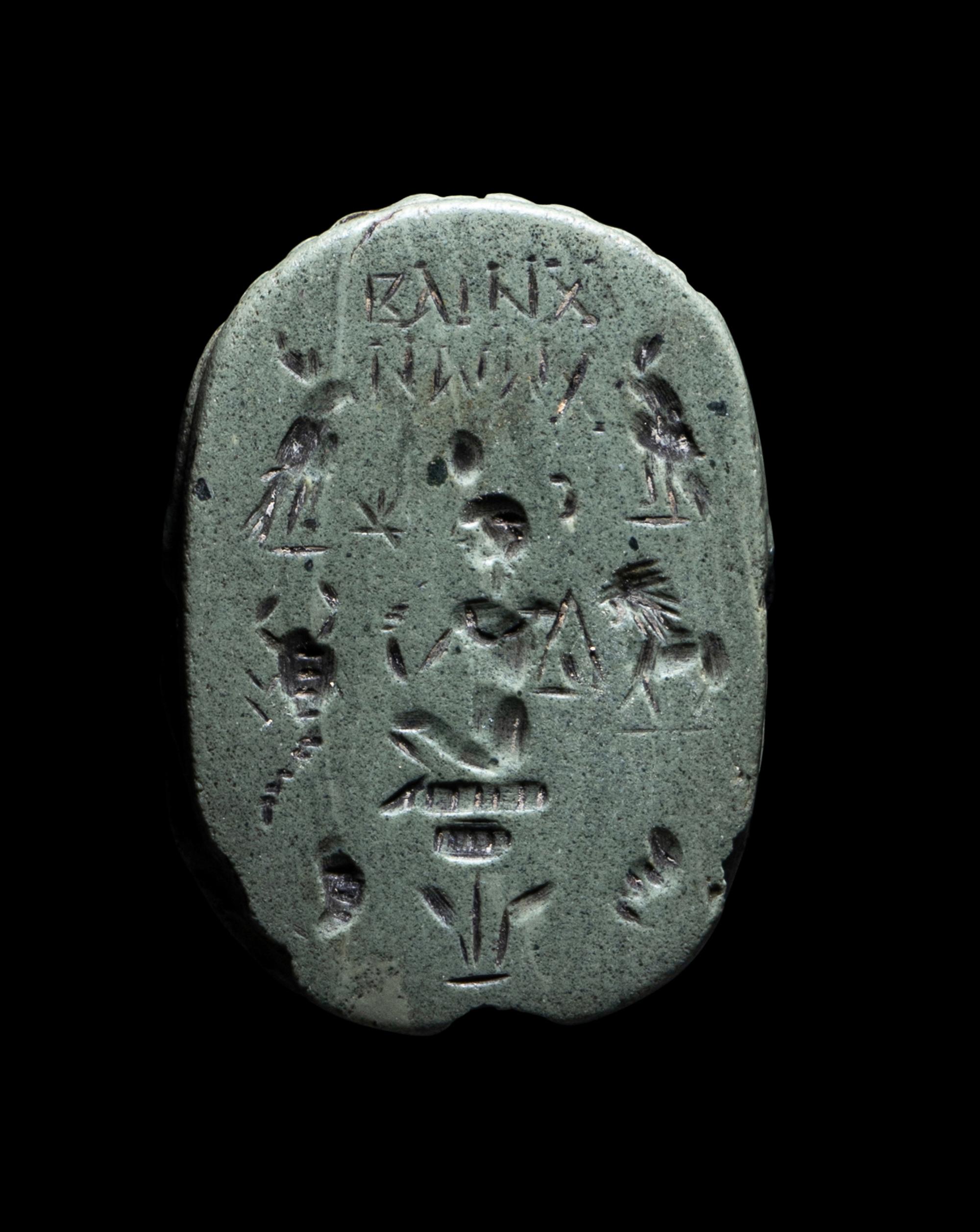 An Egyptian Faience Scarab with a Greek Inscription