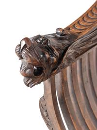 A Renaissance Revival Carved Walnut Savonarola Chair