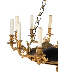 An Empire Style Gilt Bronze and Tole Ten-Light Chandelier