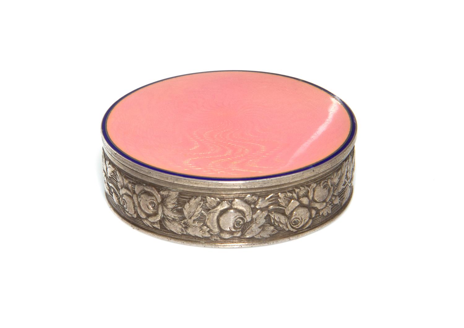 A Russian Guilloche Enameled Silver Compact, St. Petersburgh, 1996-1908, of circular form, the sides decorated with flowers in relief,