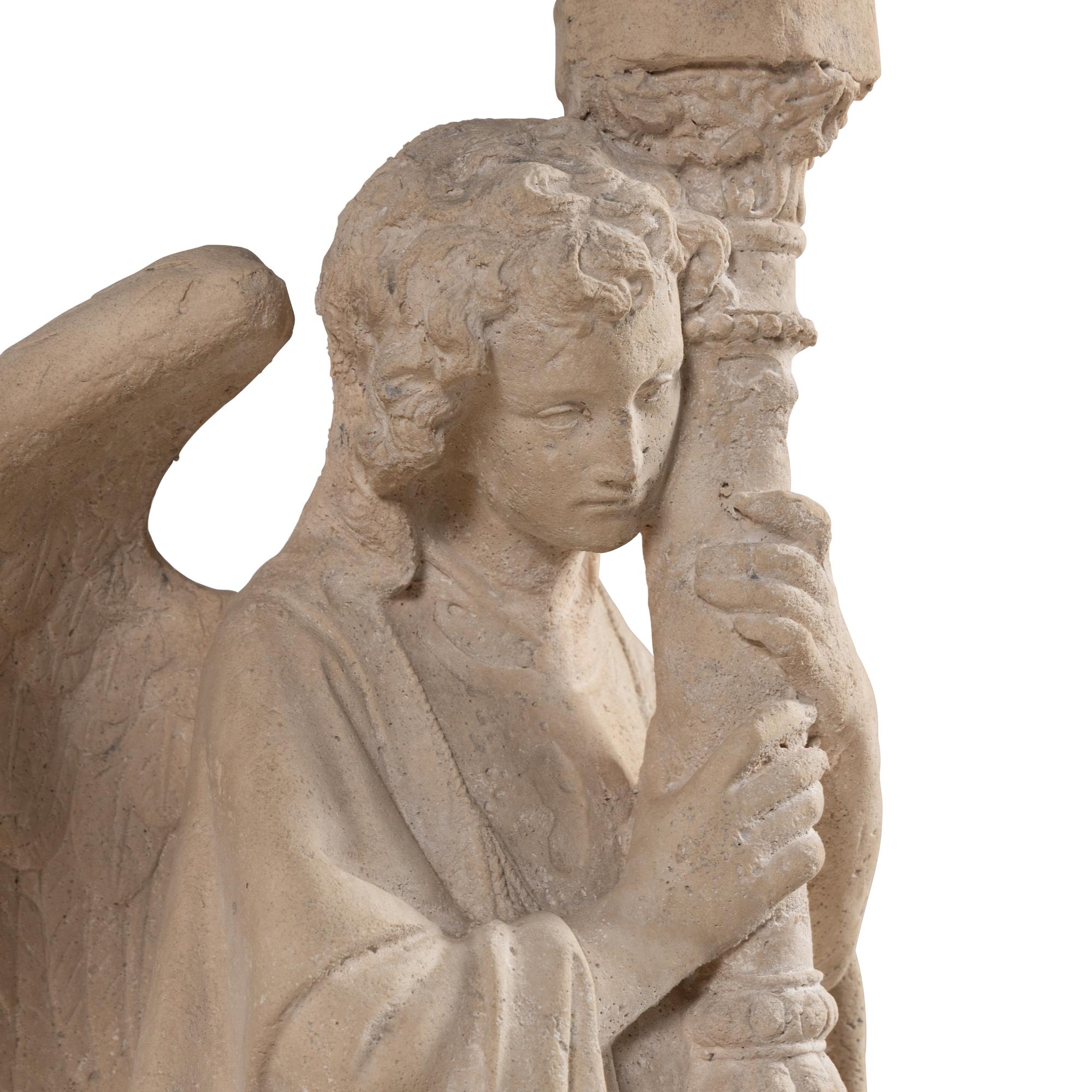 A Pair of Composition Figural Prickets