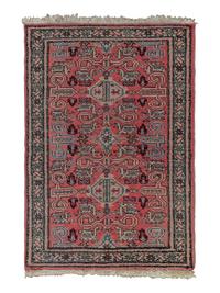 A Peperdil Wool Rug