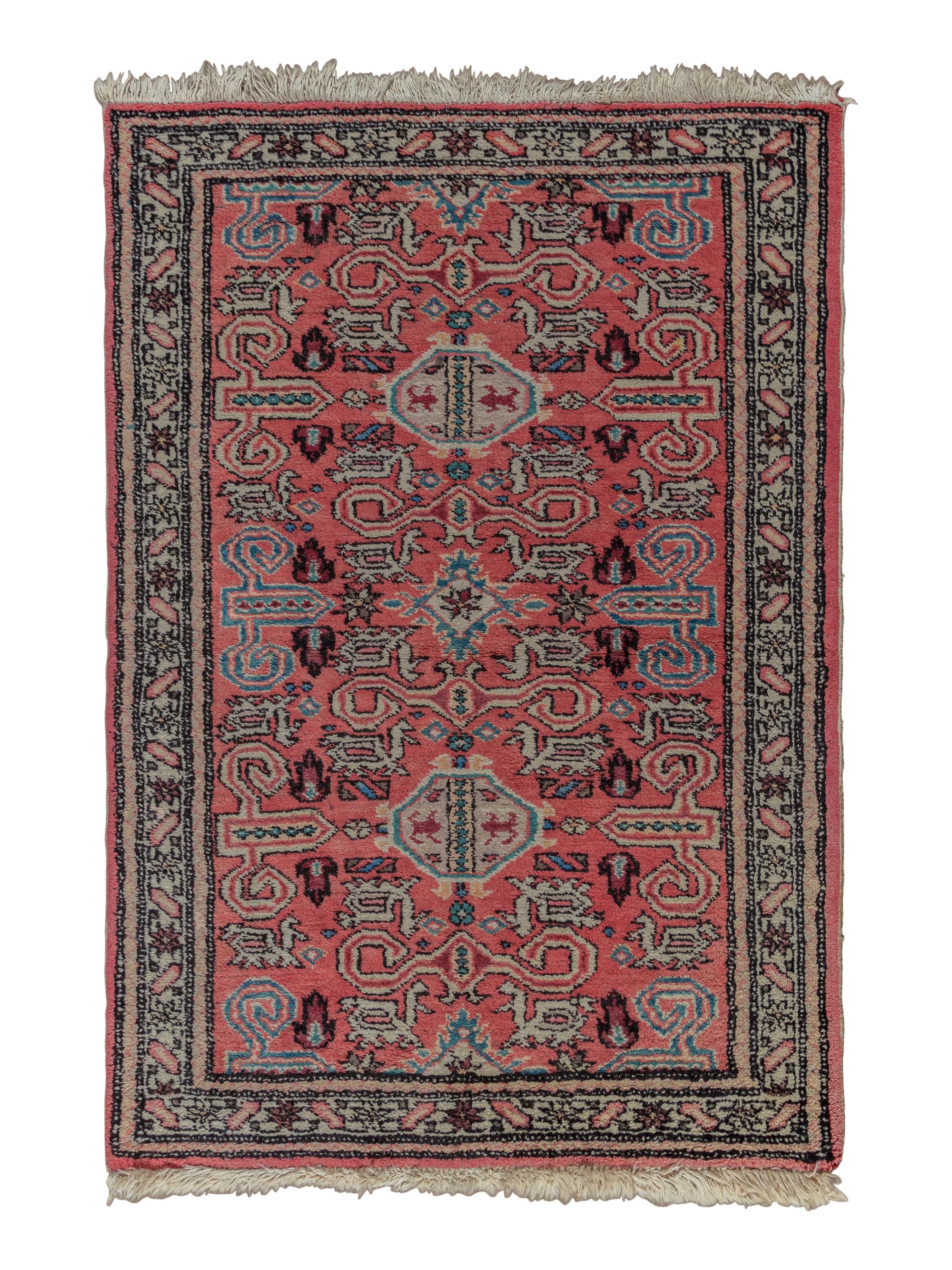 A Peperdil Wool Rug
