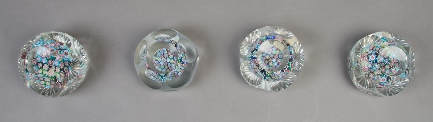 A Collection of Four Faceted Paperweights, Diameter 2 7/8 inches.