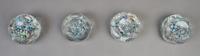 A Collection of Four Faceted Paperweights, Diameter 2 7/8 inches.