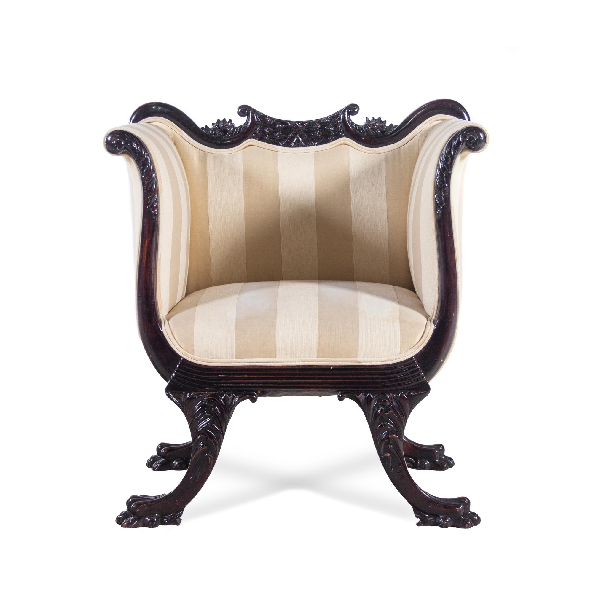 A Victorian Mahogany Settee and Armchair