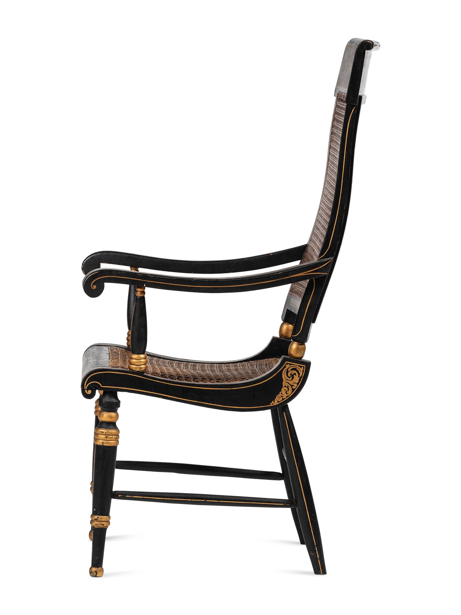 A Classical Carved, Painted and Parcel Gilt Wood Cane Seat Hitchcock Armchair
