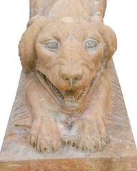 A Pair of Carved Marble Crouching Dogs — 20TH CENTURY