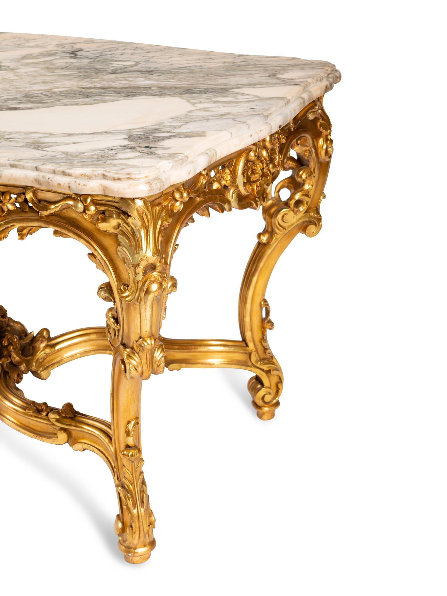 A Louis XV Style Pierce-Carved Giltwood Salon Table
