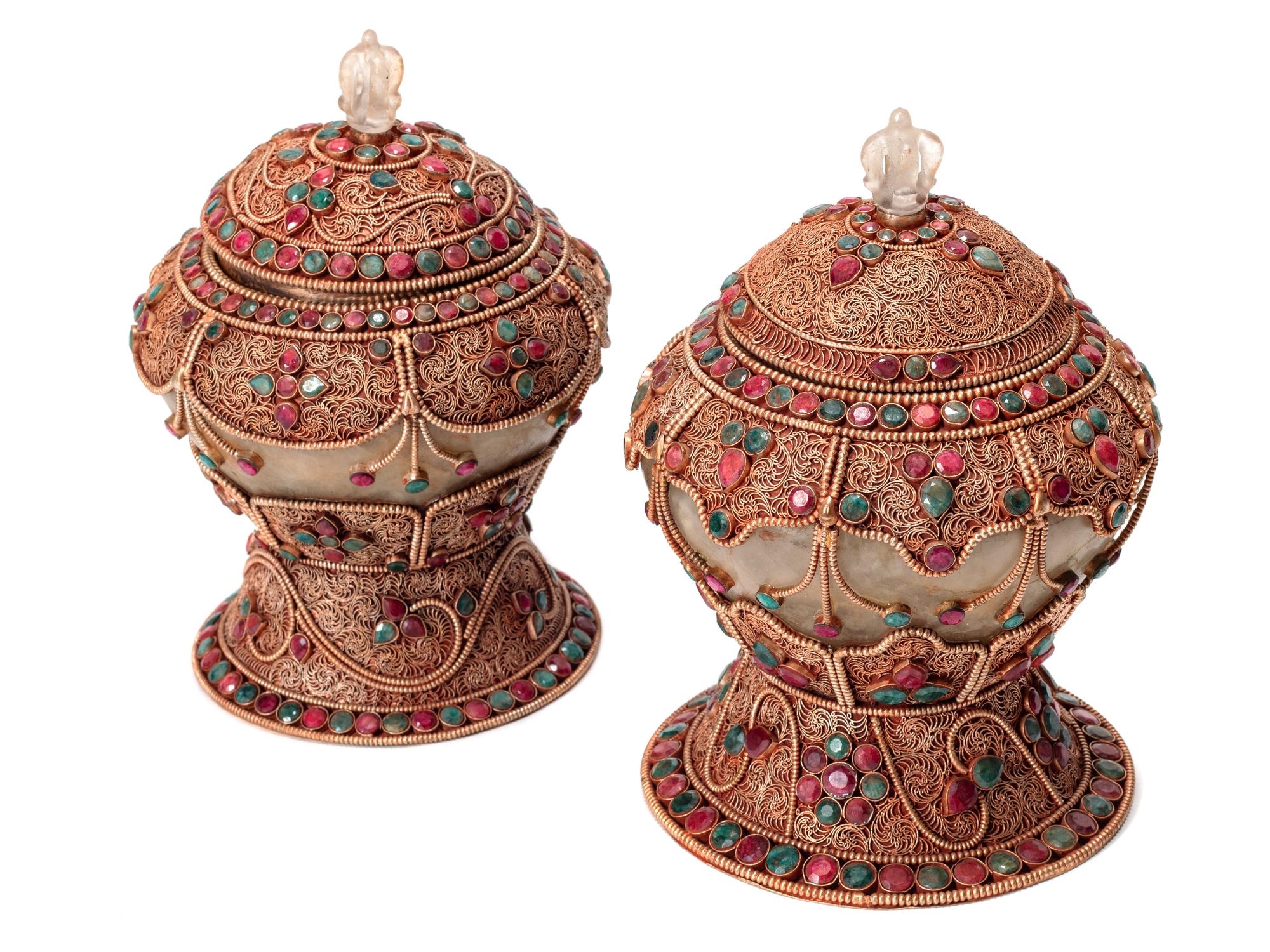 A Pair of Tibetan Style Gilt Filigree, Emerald and Ruby Mounted Rock Crystal Bowls with Covers