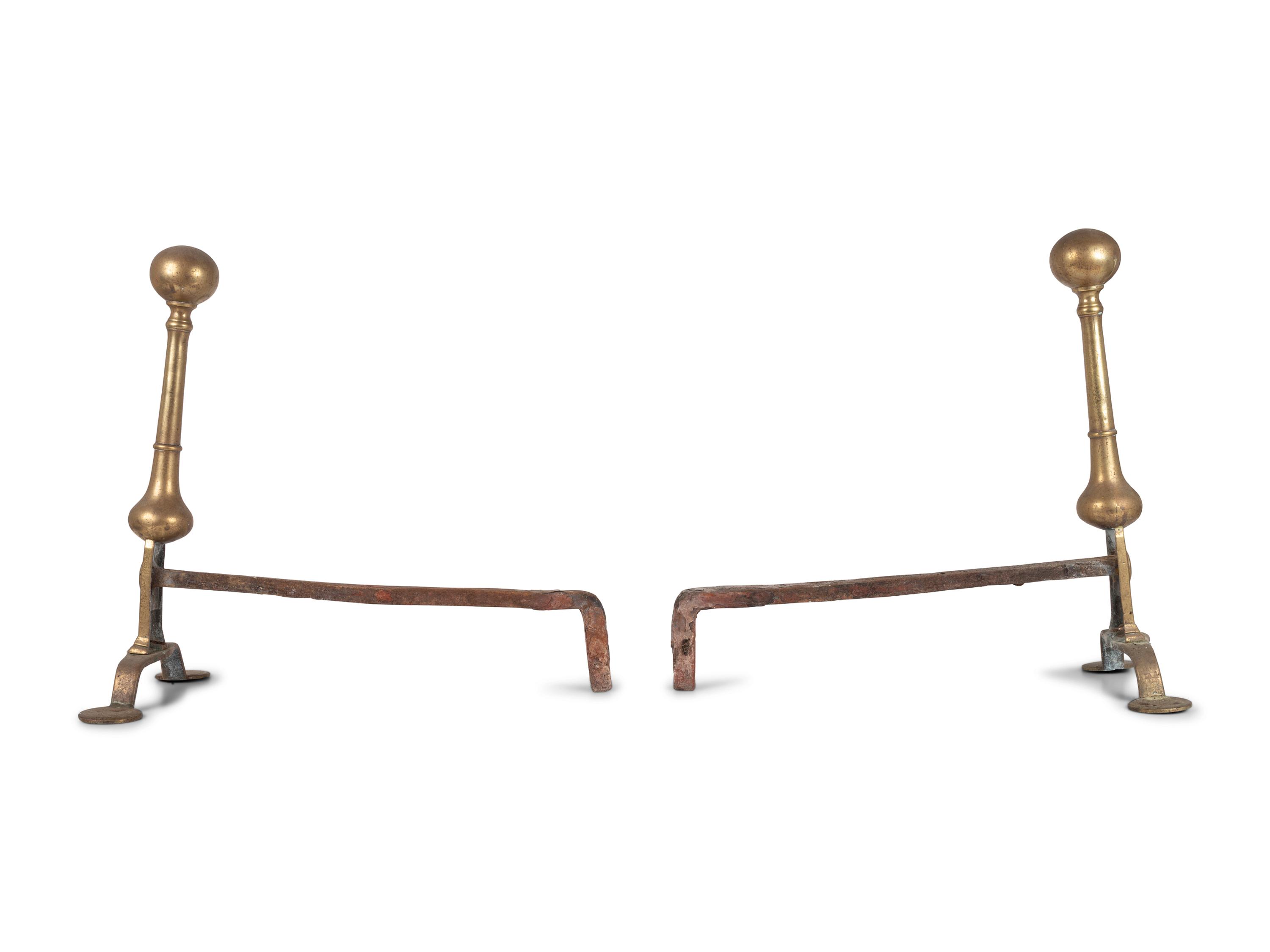 A Pair of Queen Anne Brass and Wrought-Iron Wafer Foot Andirons