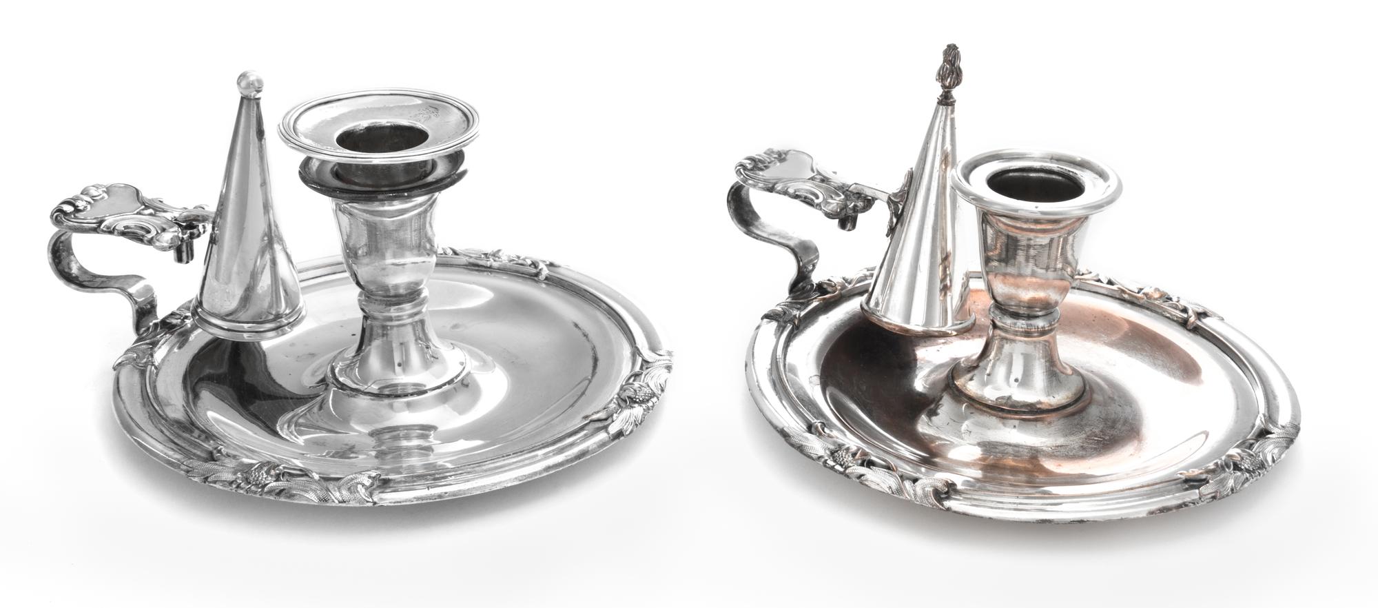 A Pair English Silver-Plate Chambersticks, 19th Century, each border spaced at four intervals with foliate ornaments.