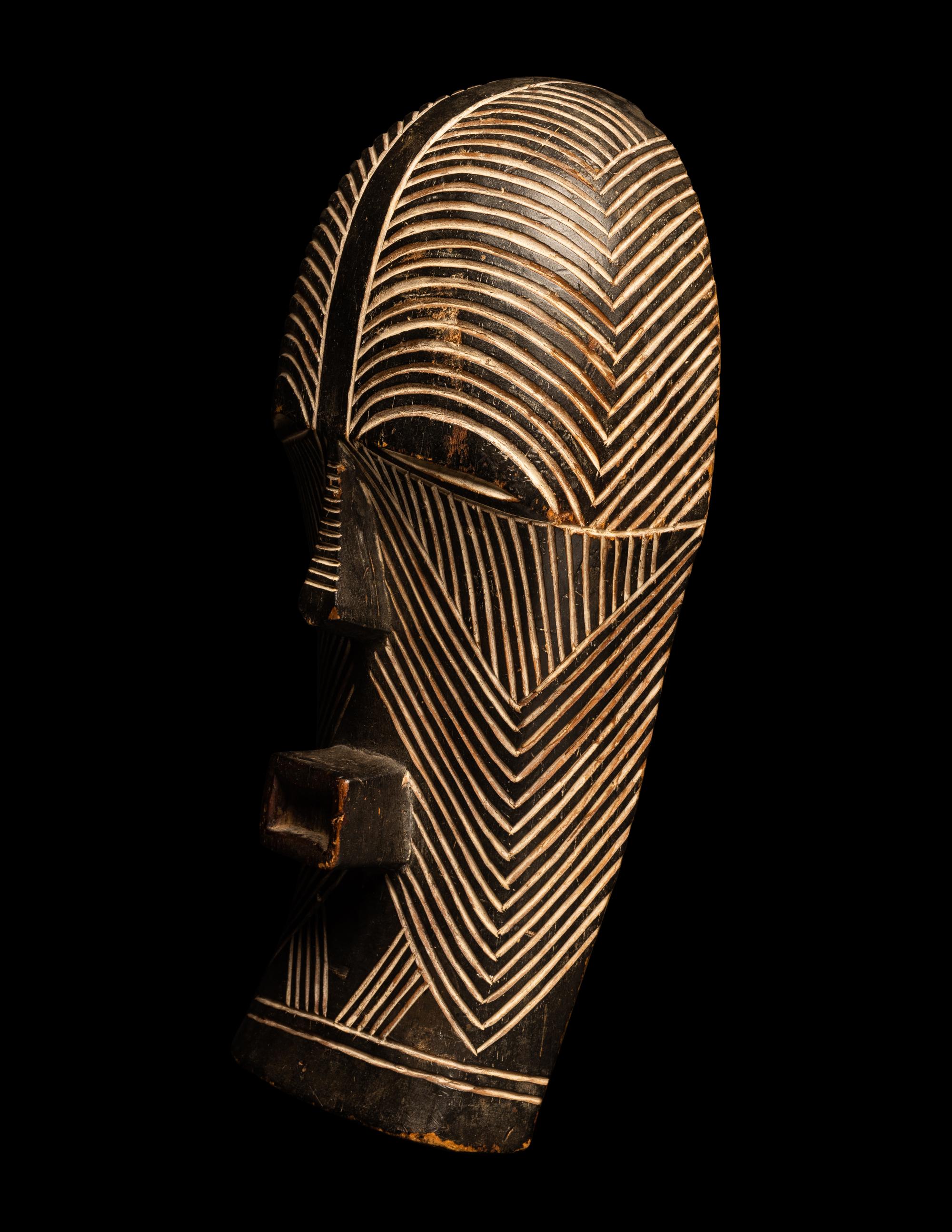 A Songye Wood Female Mask (Kifwebe)