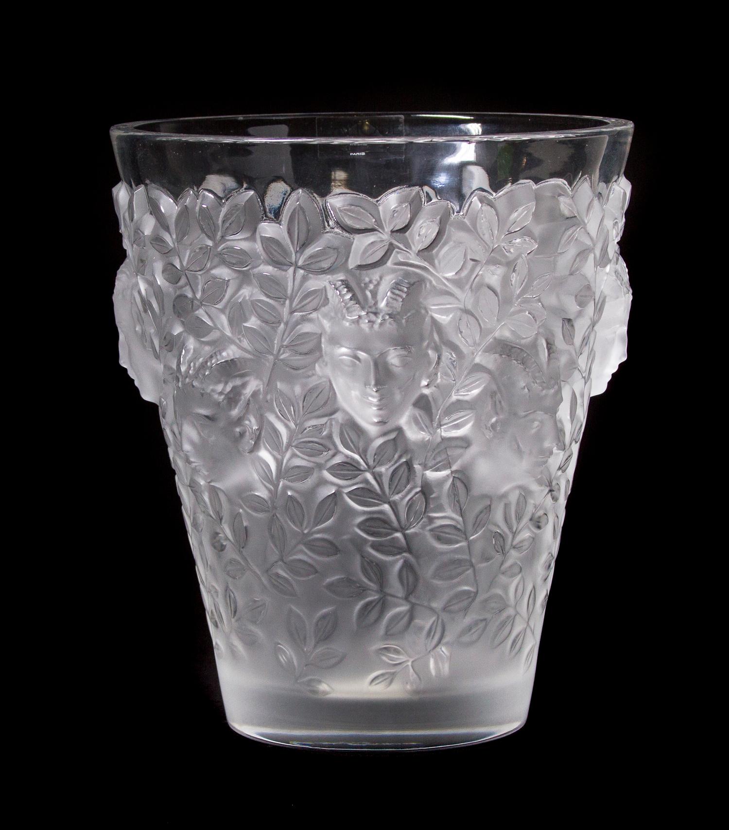 A Lalique Molded and Frosted Glass Vase, Height 8 inches.