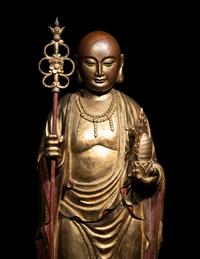 A Chinese Gilt and Lacquered Wood Figure of a Standing Monk