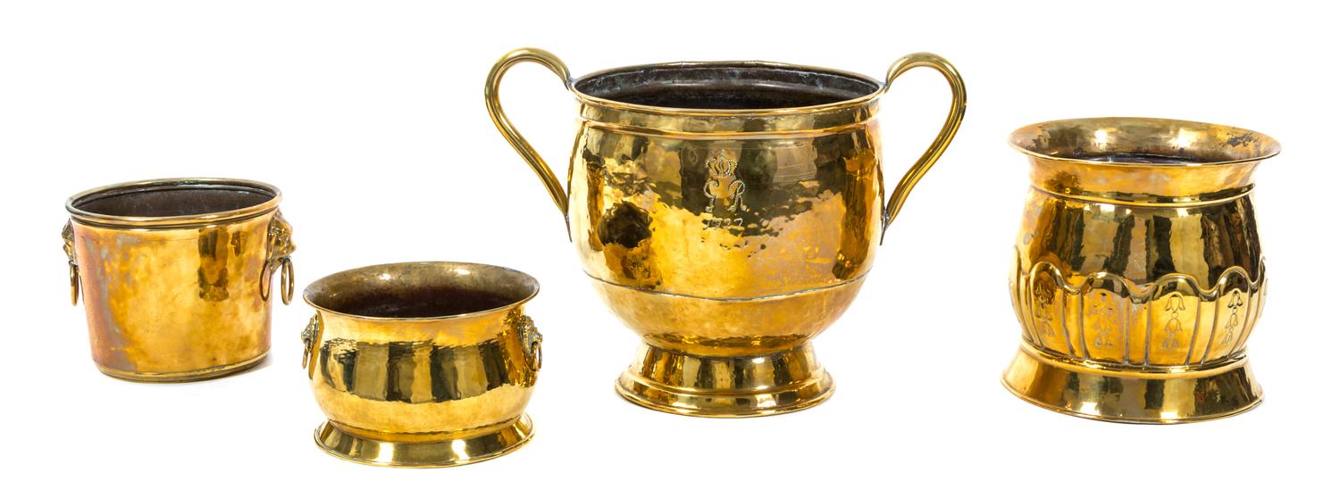 A Group of Four Hammered Brass Planters Height of largest 14 x diameter 14 inches. — 20TH CENTURY