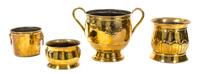 A Group of Four Hammered Brass Planters Height of largest 14 x diameter 14 inches. — 20TH CENTURY