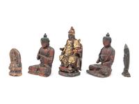 A Group of Five Carved Buddhas