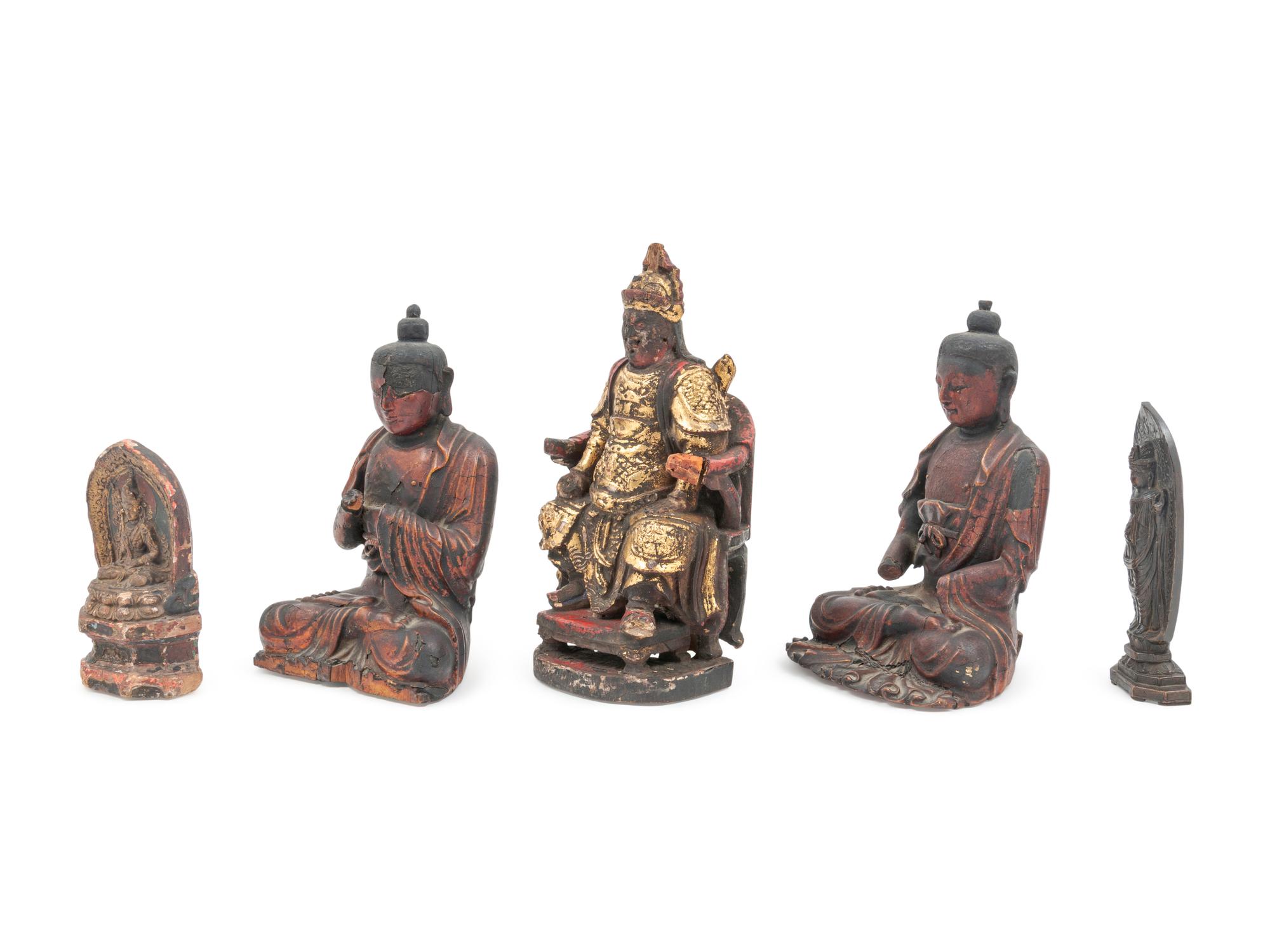 A Group of Five Carved Buddhas