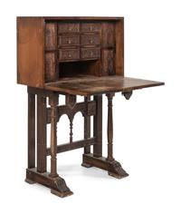 A Spanish Baroque Style Walnut Vargueño and Stand