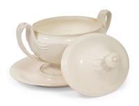 A French White Glazed Faïence Tureen and Underplate