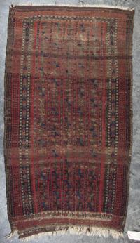 A Group of Three Rugs Largest 5 feet 10 inches x 3 feet 4 inches.