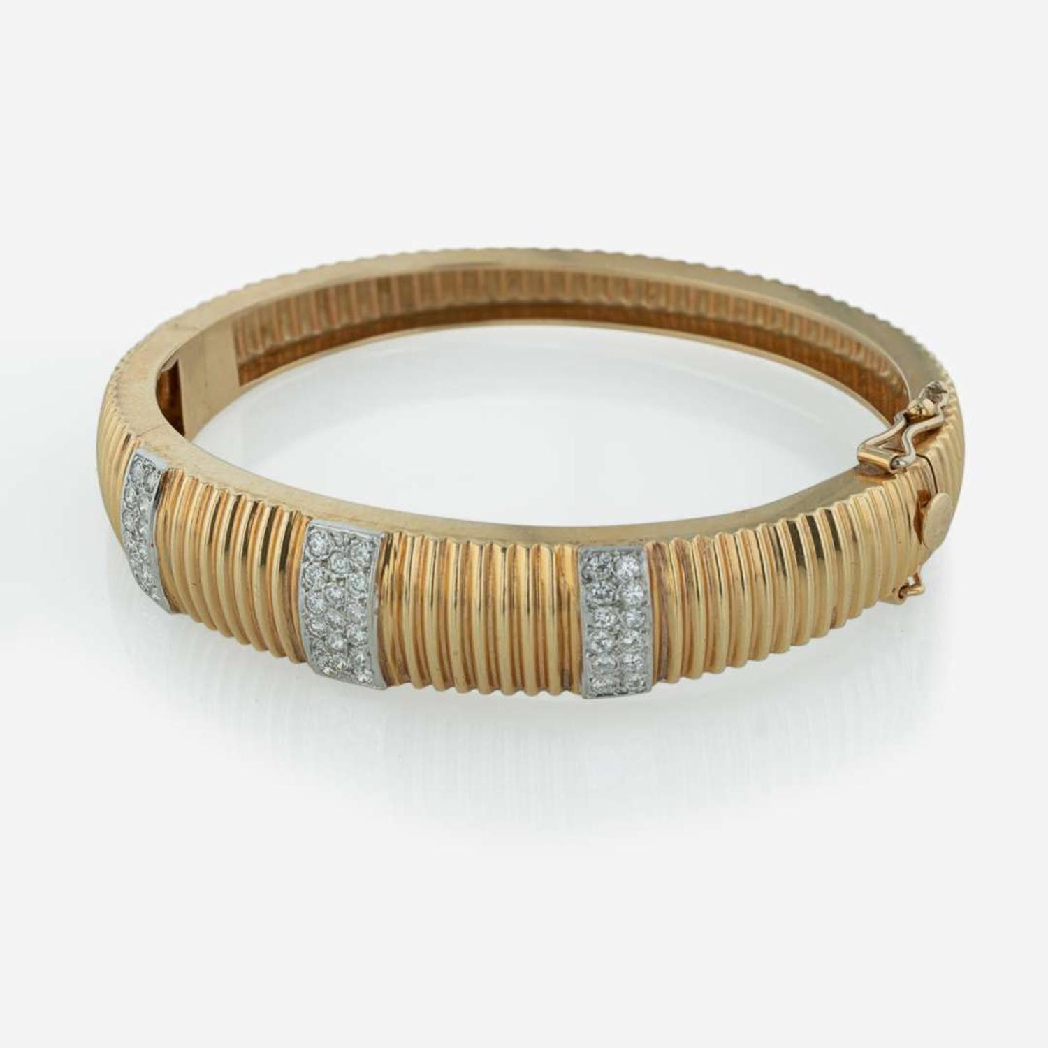 A 14K Yellow Gold and Diamond Bracelet