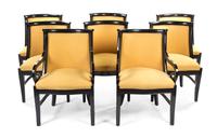 A Set of Eight Regency Style Ebonized and Parcel Gilt Chairs, Height 33 1/2 inches.