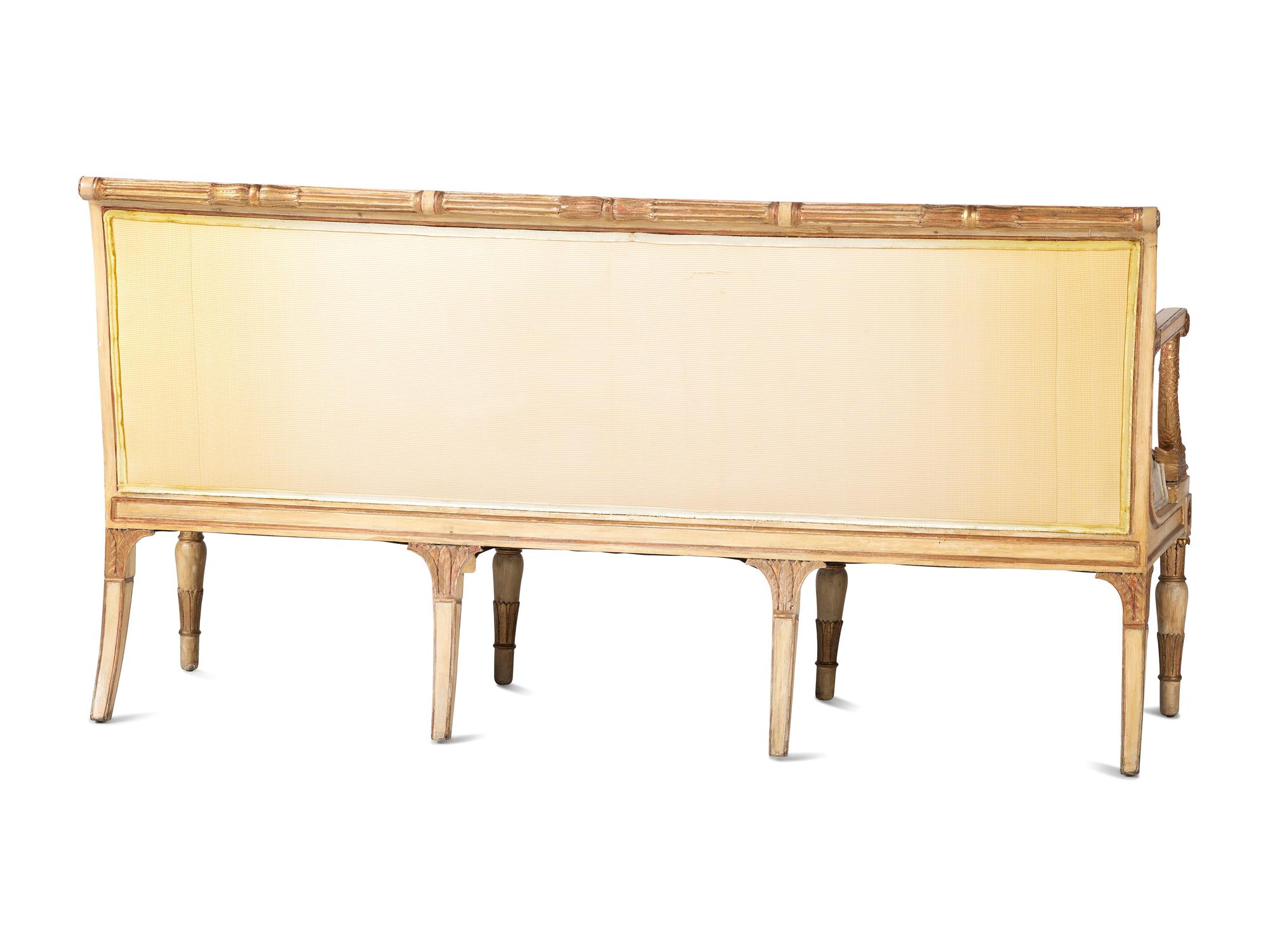 A Louis XVI Style Gold and Cream Paint Decorated Upholstered Settee