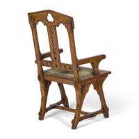 A Gothic Revival Patent Gothic Star Walnut Arm Chair