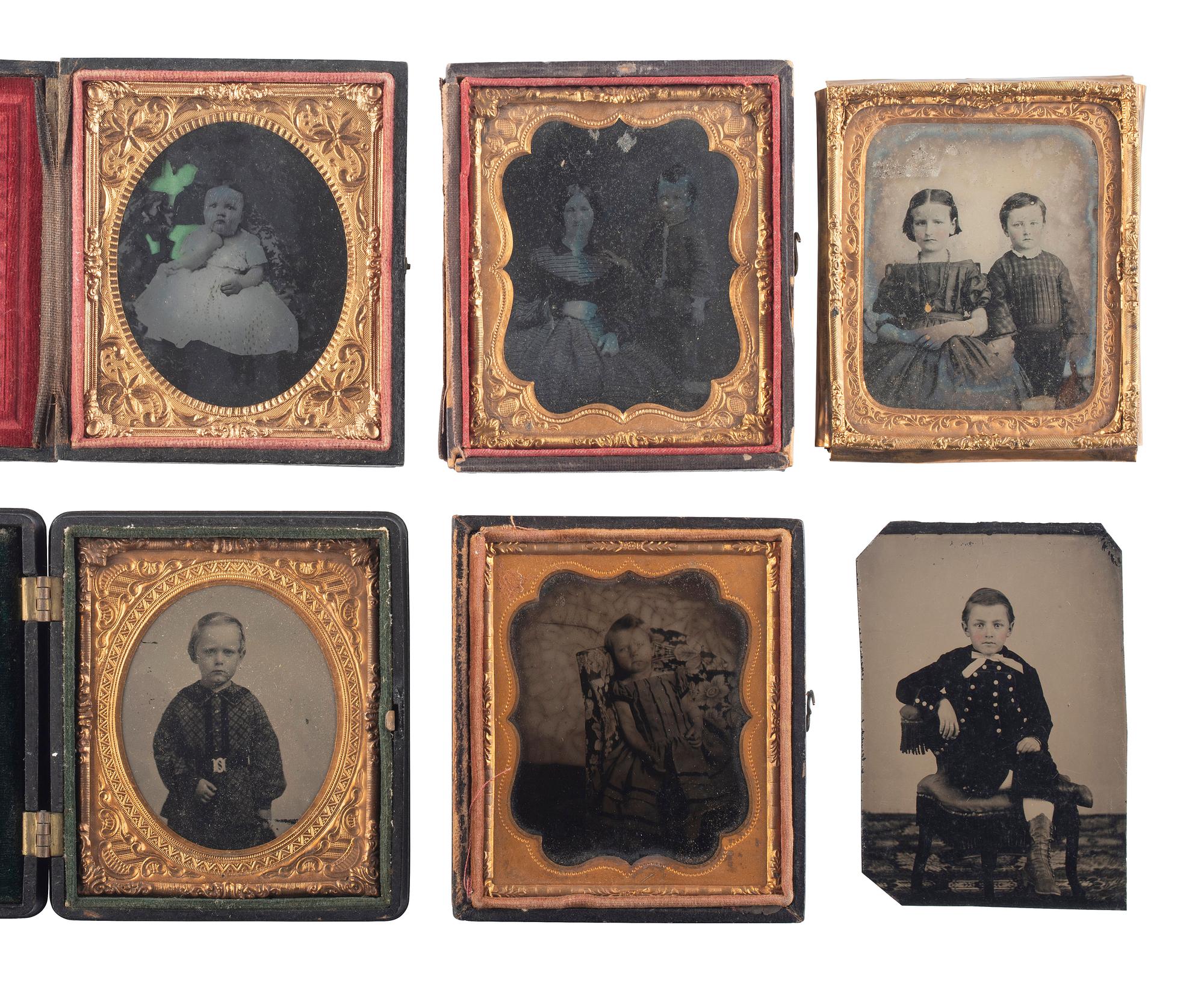 [EARLY PHOTOGRAPHY]. A group of 19 ambrotypes and tintypes of children of varying ages, some posed with their parents, incl. African American infant and pairs of images taken during the same sitting.