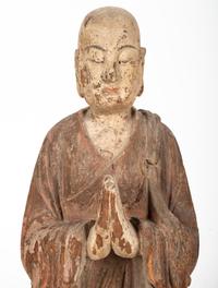 A Chinese Carved Wood Standing Figure with Polychrome Decoration