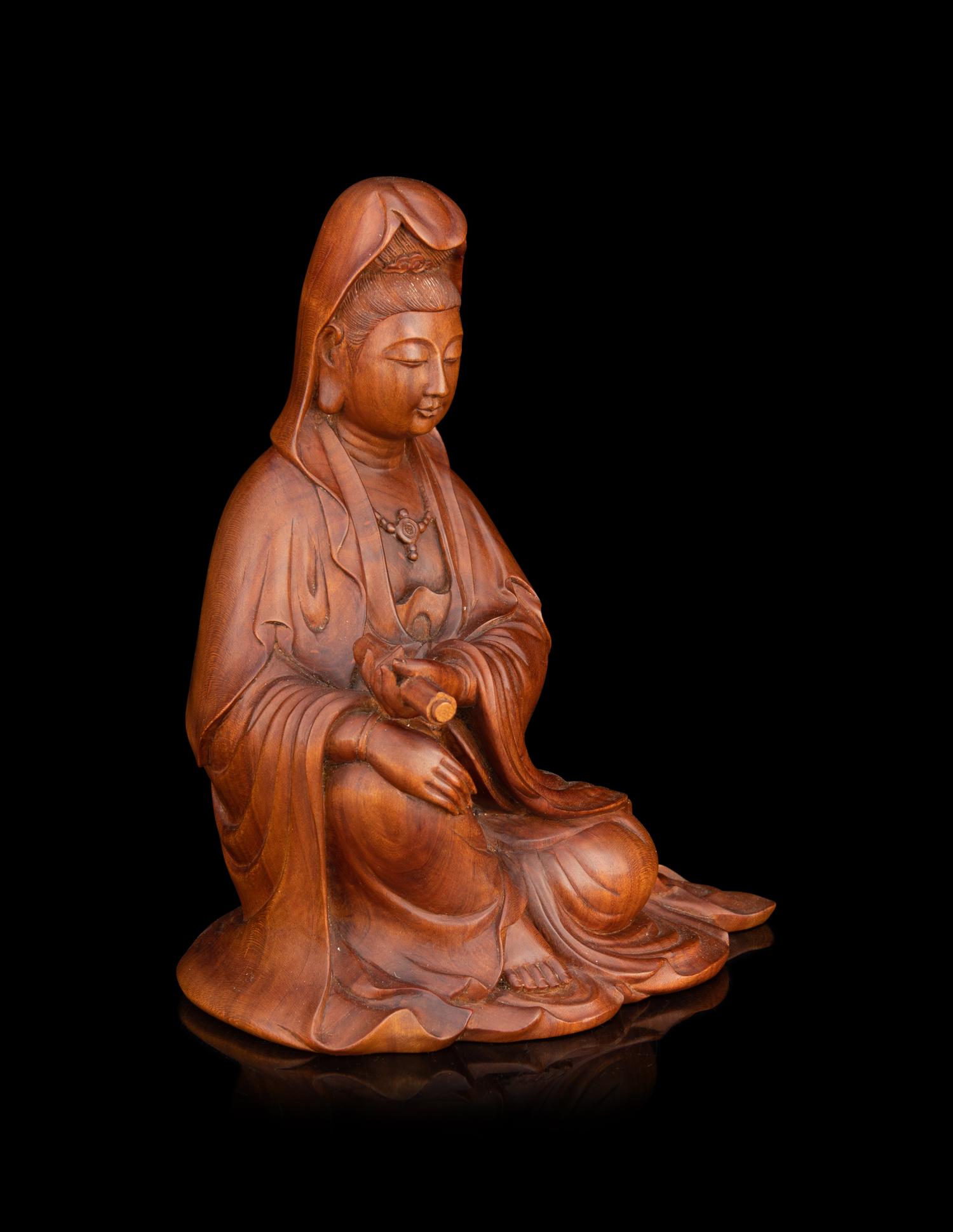 A Japanese Carved Boxwood Figure of Kannon