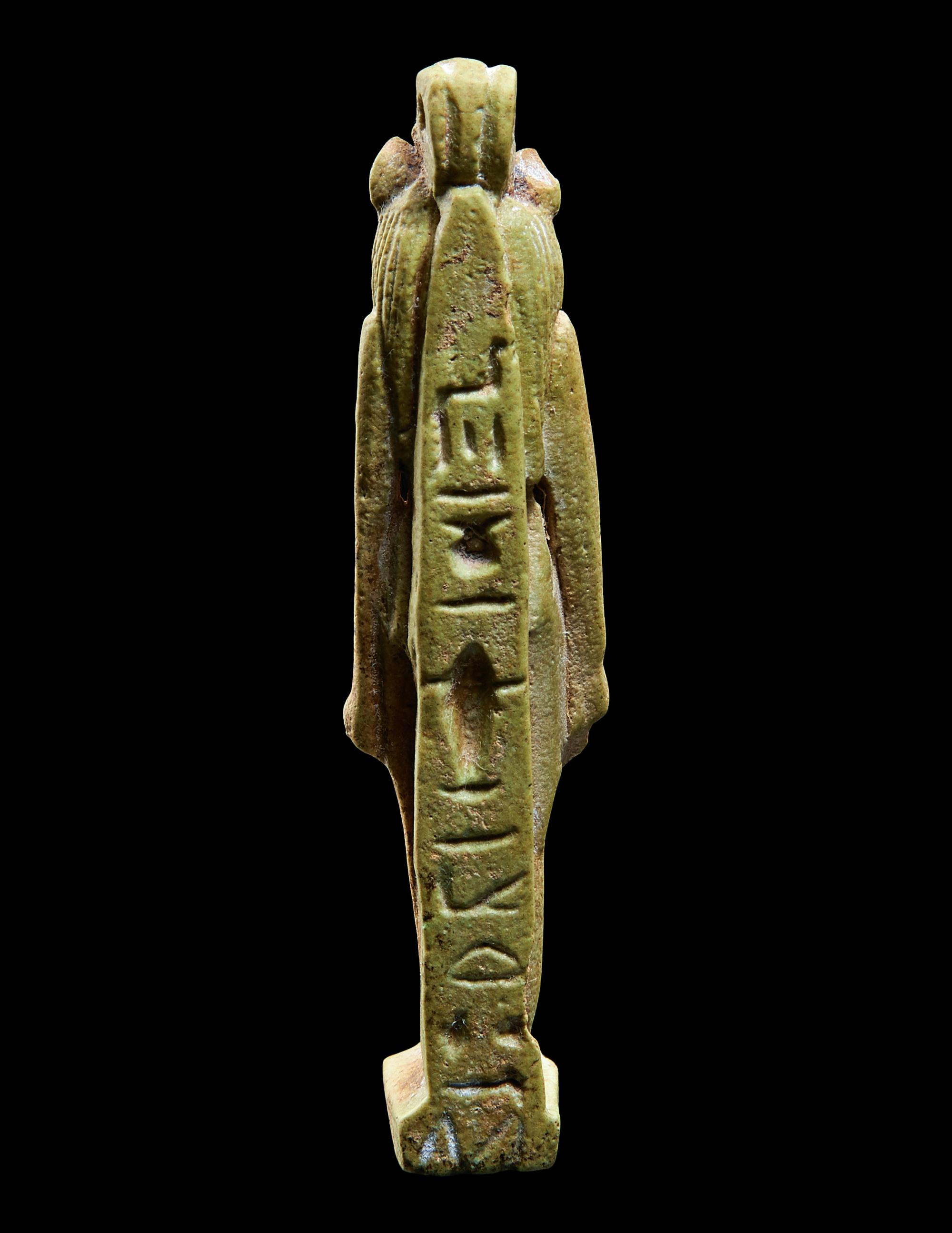 An Egyptian Faience Striding Sekhmet