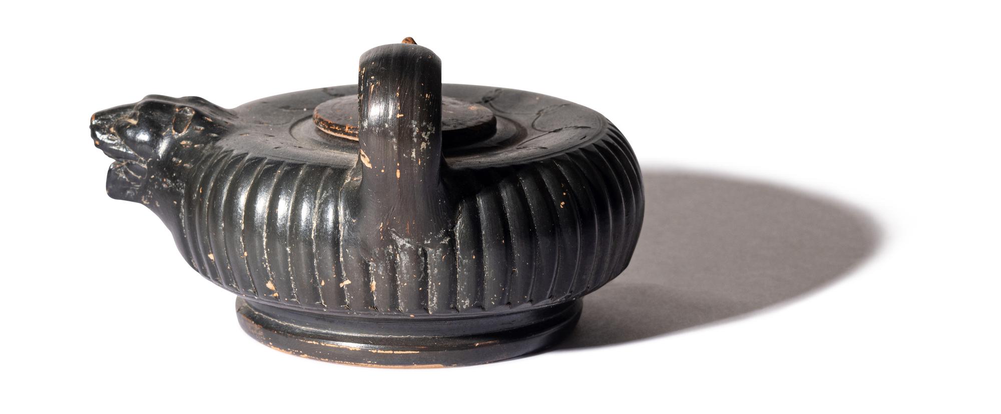 A Greek Black-Glazed Guttus
