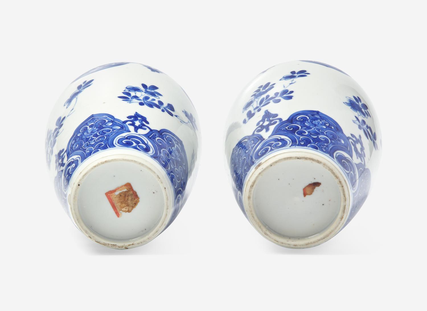 A Similar Pair of Chinese Blue and White Ovoid Jars and Covers
