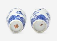 A Similar Pair of Chinese Blue and White Ovoid Jars and Covers