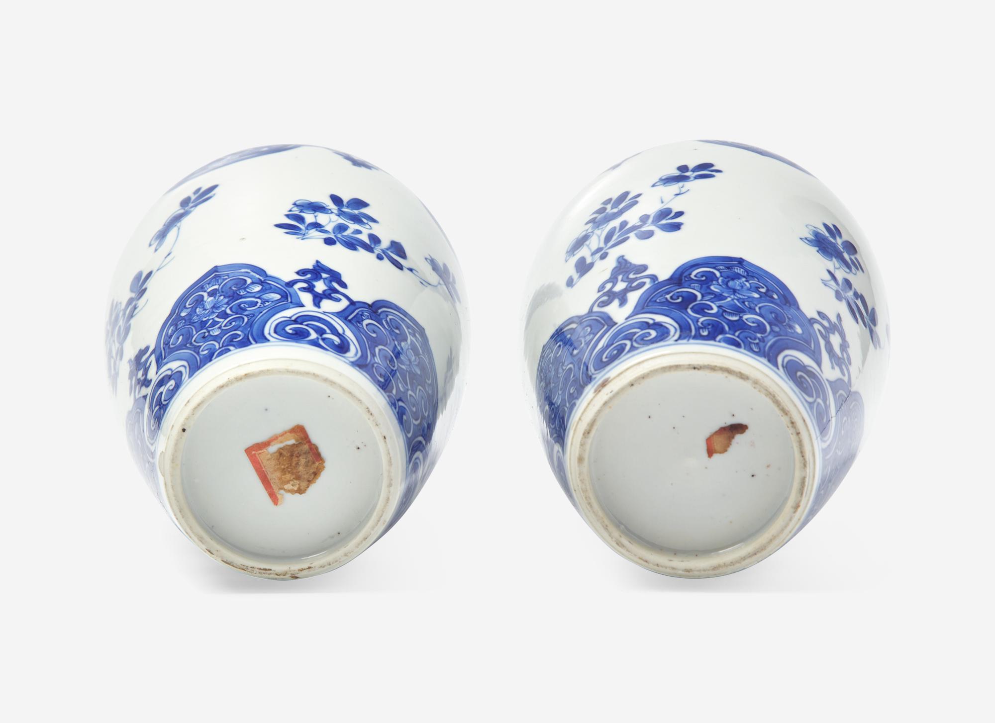 A Similar Pair of Chinese Blue and White Ovoid Jars and Covers