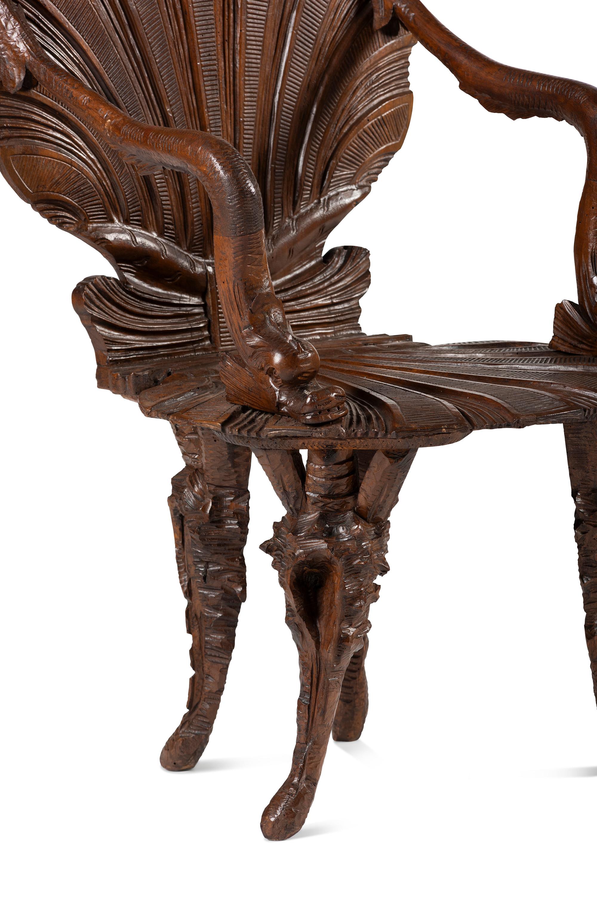 A Pair of Venetian Shell-and-Dolphin Carved Walnut Grotto Armchairs