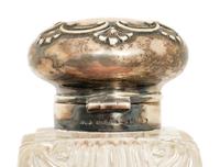 A Group of Silver and Brass Mounted Crystal Inkwells