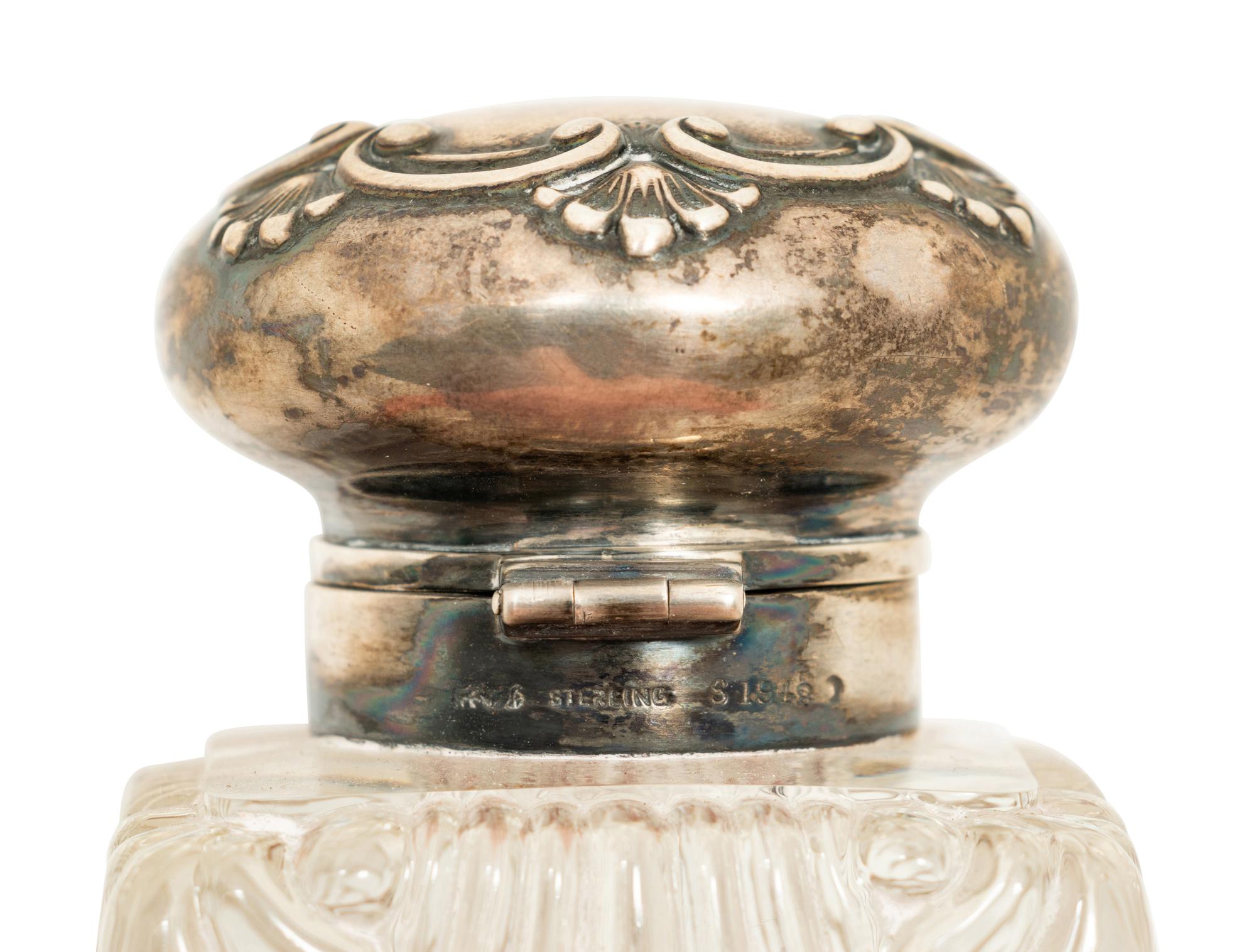A Group of Silver and Brass Mounted Crystal Inkwells