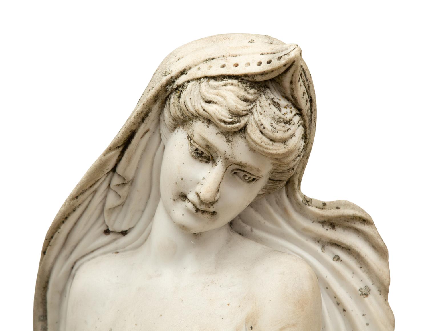 A Carved Marble Figure of a Water Maiden