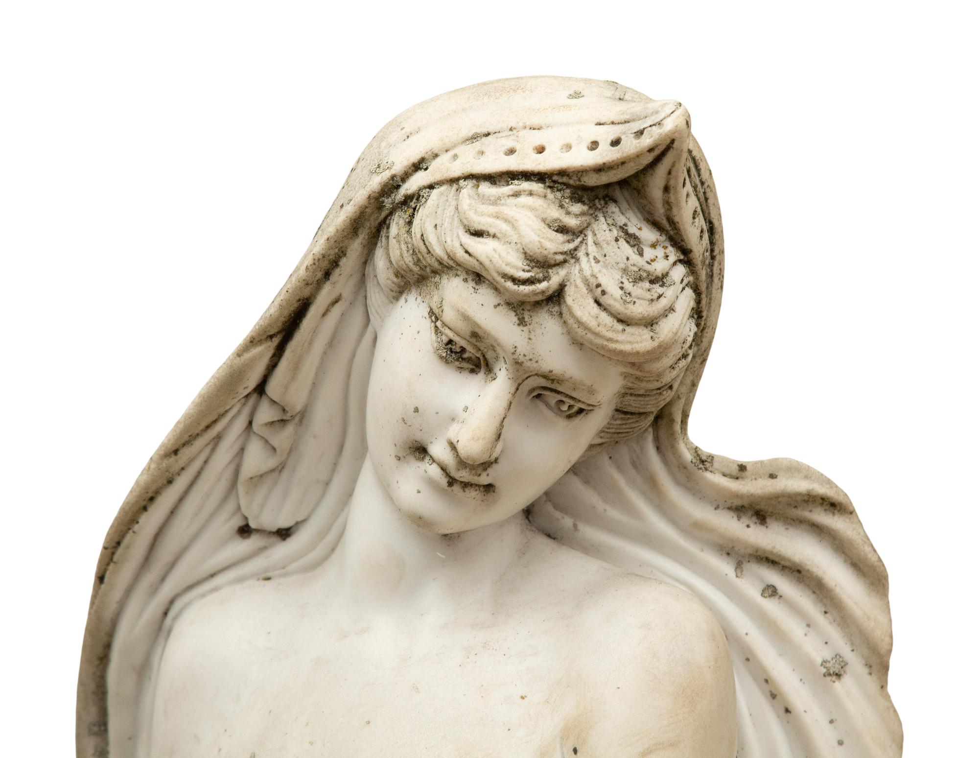 A Carved Marble Figure of a Water Maiden