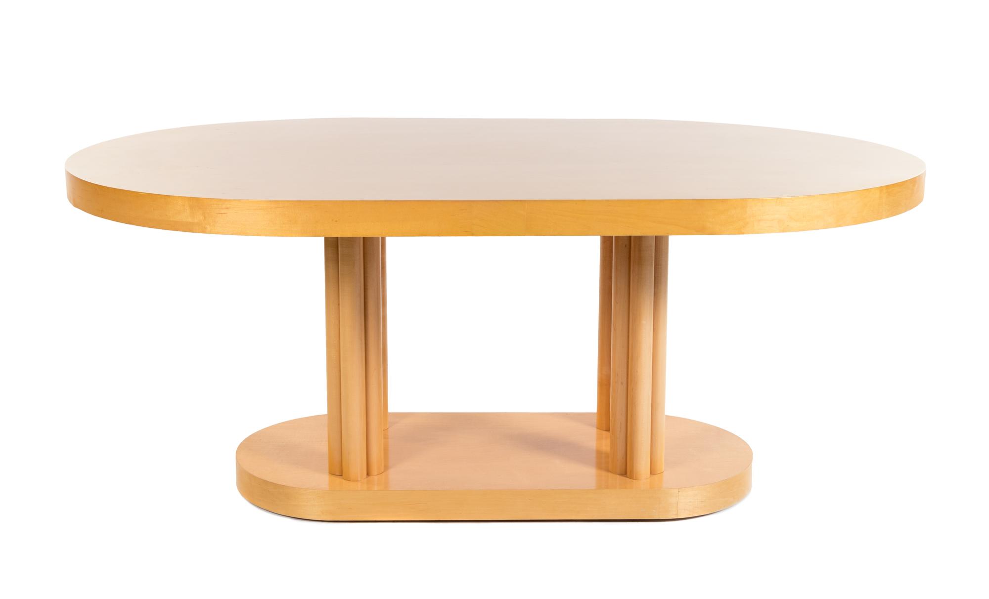 A Contemporary Maple Dining Suite