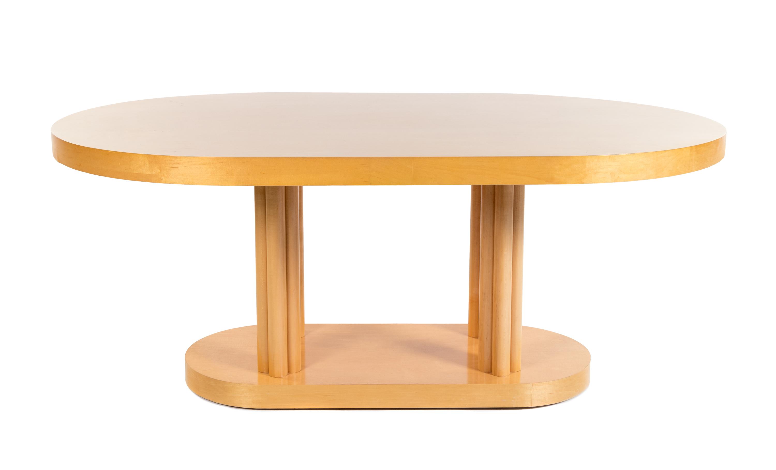 A Contemporary Maple Dining Suite