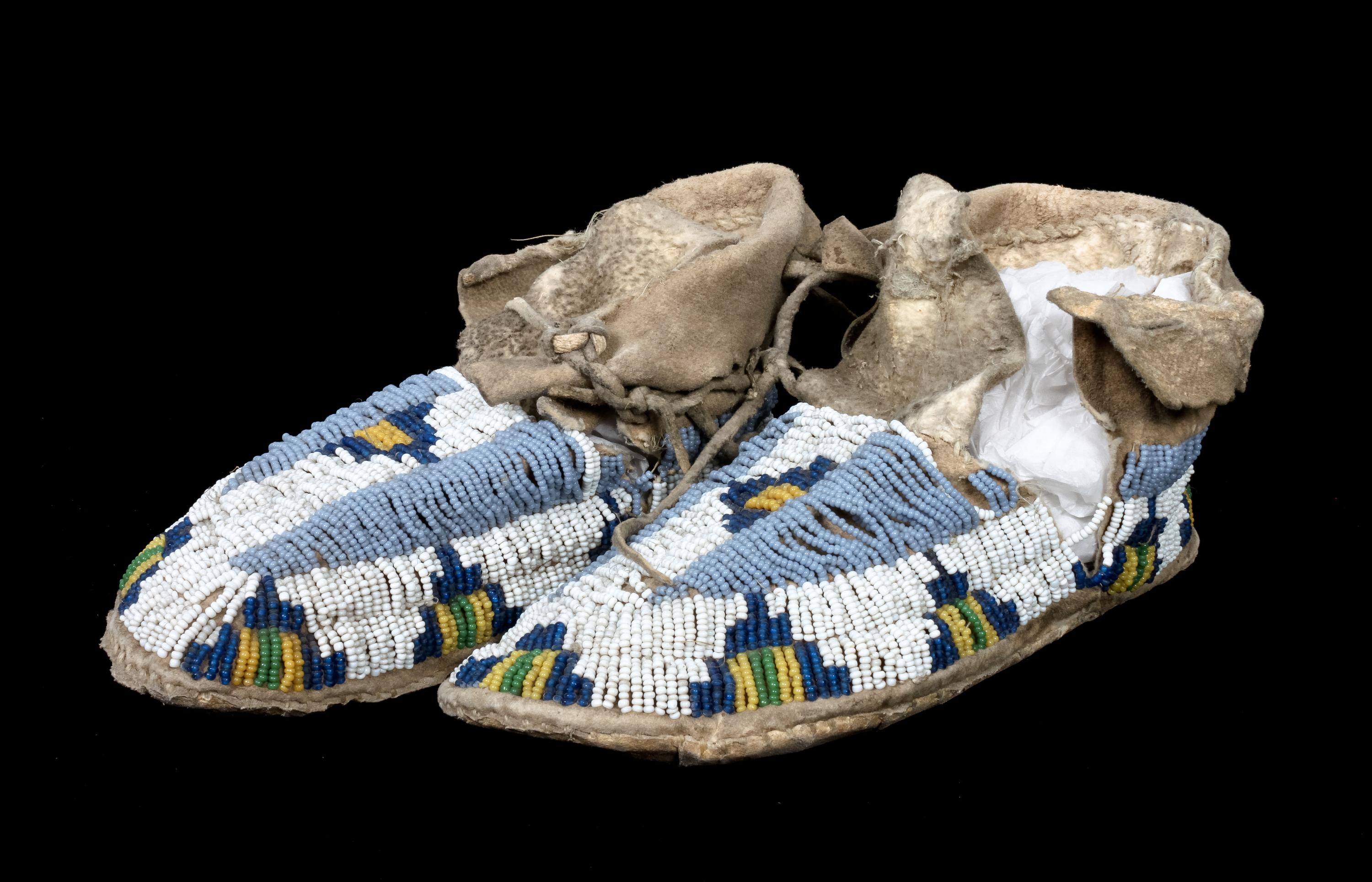 A Pair of Sioux Beaded Moccasins Length 7 1/2 inches.