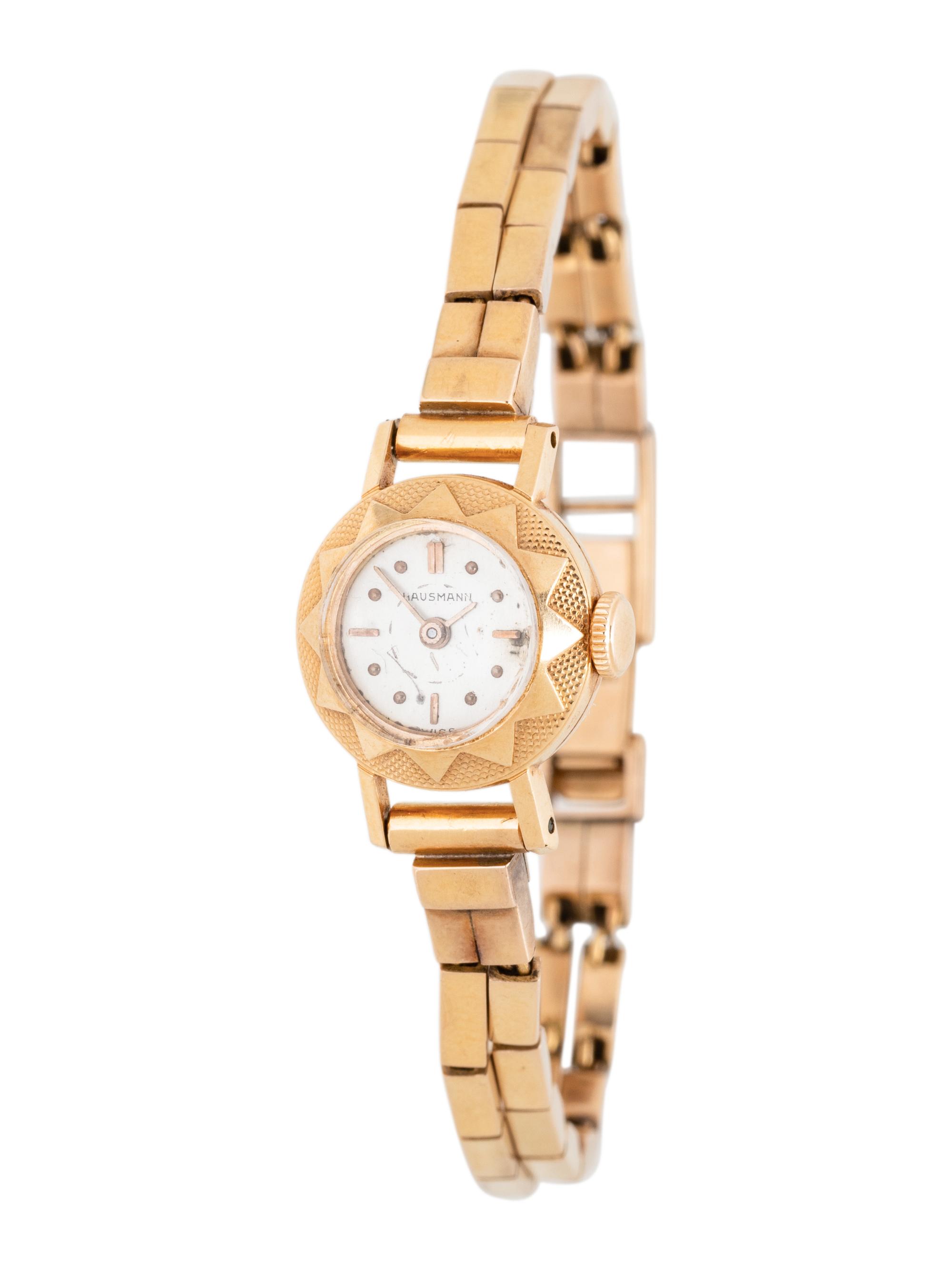 HAUSMANN, 18K YELLOW GOLD WATCH